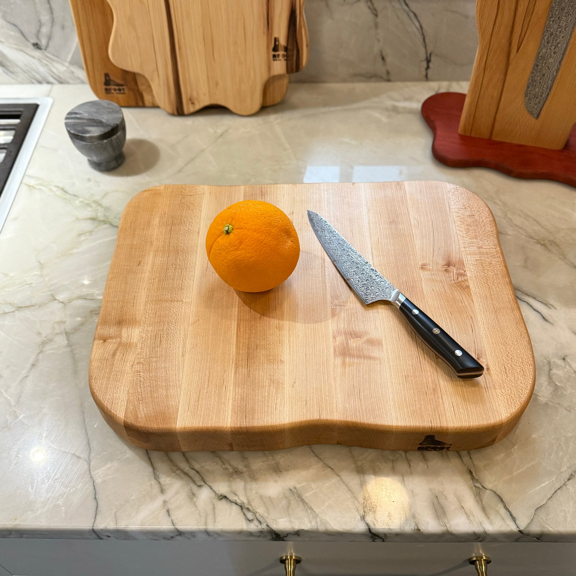 wood_cutting_board_side_grain_maple with orange